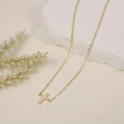 Collier croix dorée – Foi discrète